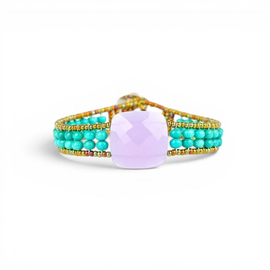 Trebor Style Ziio Armonia tennis bracelet with a central violet amethyst, turquoise beads, and gold Murano glass.