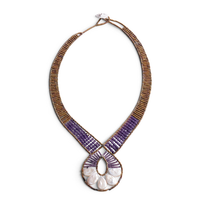 Trebor Style Ziio Ariane necklace featuring a Mother of Pearl fan pendant, Amethyst beads, and Murano glass accents.