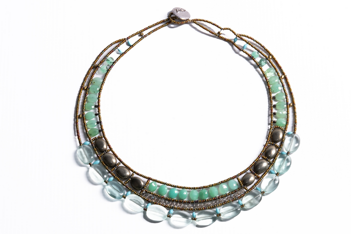 Trebor Style Ziio Atlas statement necklace featuring green chrysophrase, fluorite, turquoise, and pyrite gemstones.