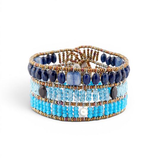 Trebor Style Ziio cuff bracelet featuring blue lapis, kyanite, zircon, black spinel, and pearls on Murano glass beads.