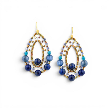 Trebor Style Ziio Shinju blue gemstone drop earrings featuring lapis, iolite, and apatite beads on gold Murano glass.