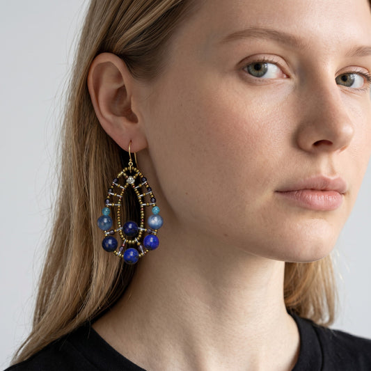 Trebor Style Ziio Shinju blue gemstone drop earrings featuring lapis, iolite, and apatite beads on gold Murano glass.