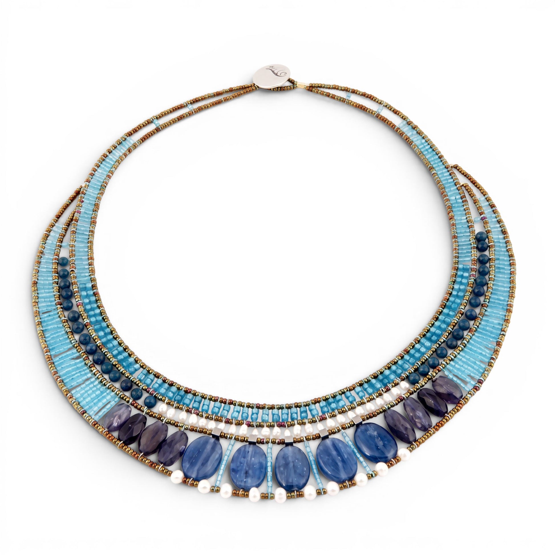 Trebor Style Ziio statement necklace featuring blue kyanite, iolite, zircon, pearls, and Murano glass beads.