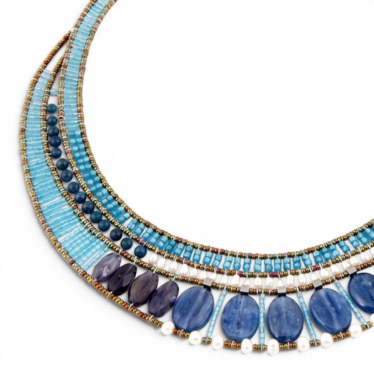 Trebor Style Ziio statement necklace featuring blue kyanite, zircon, iolite, pearls, and Murano glass beads on wire.