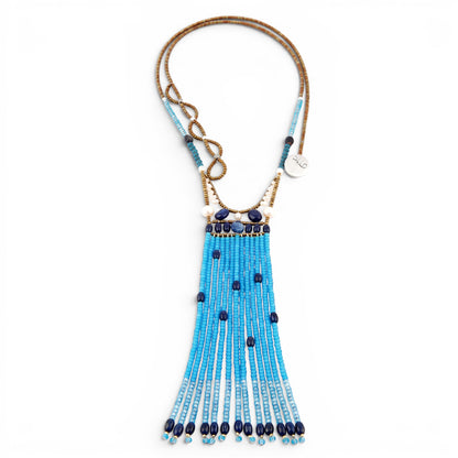 Trebor Style Ziio long blue gemstone tassel pendant necklace with lapis, kyanite, apatite, and Murano glass beads.