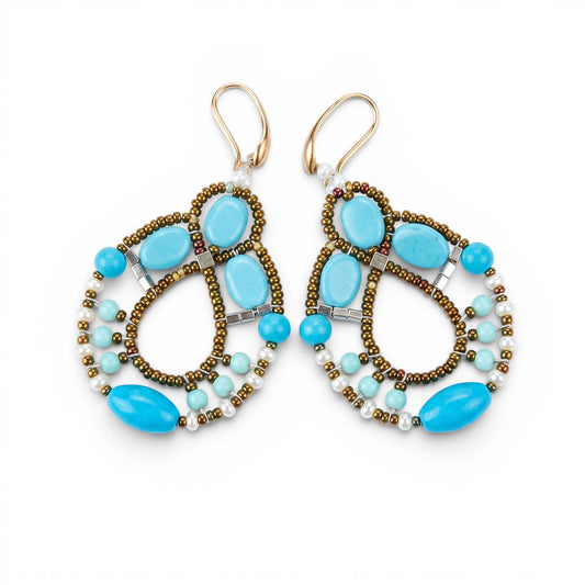 Trebor Style Ziio Galaxie chandelier earrings featuring blue magnesite, seed pearls, and turquoise beads on gold posts.
