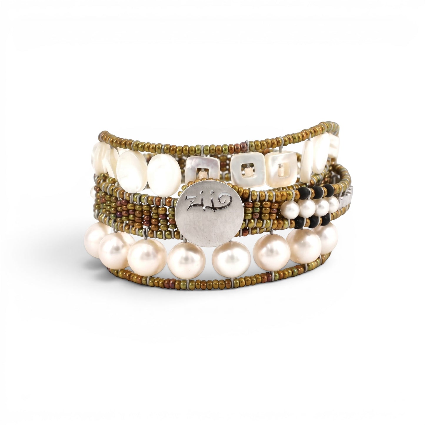 Trebor Style Ziio Evolution bracelet featuring white mother of pearl, water pearls, and Murano glass beads on wire.