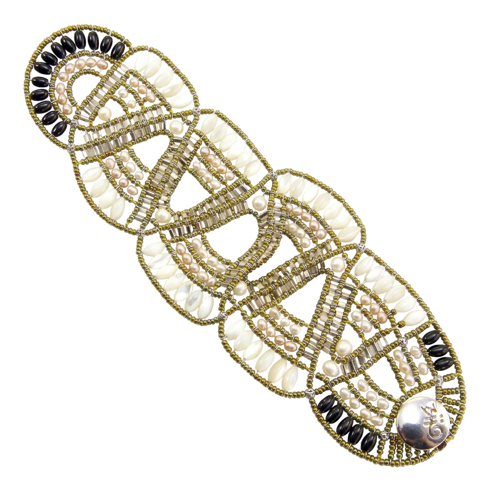 Trebor Style Ziio cuff bracelet with mother of pearl, black onyx, and pearls on golden Murano glass bead wire.
