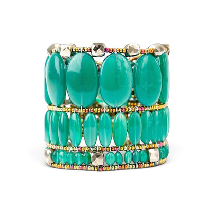 Trebor Style Ziio cuff bracelet featuring vibrant oval green onyx gemstones, pyrite beads, and Murano glass accents.