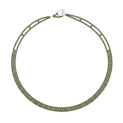 Trebor Style Ziio narrow Giro necklace featuring hunter green zircon gemstones, Murano glass beads, and silver closure.