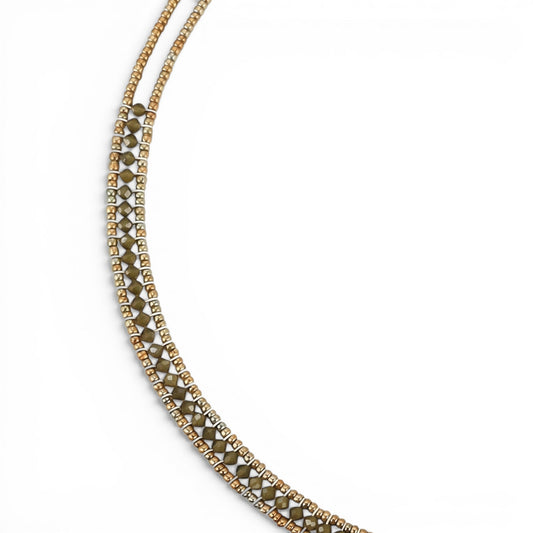 Trebor Style Ziio narrow Giro necklace featuring hunter green zircon gemstones, Murano glass beads, and silver closure.
