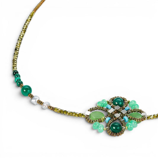 Trebor Style Ziio Knott necklace featuring green malachite and chrysoprase gemstones with Murano glass beads.