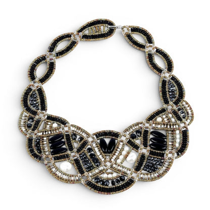 Trebor Style Ziio New Romance bib necklace featuring black onyx, white pearls, and sterling silver beads in Italy.