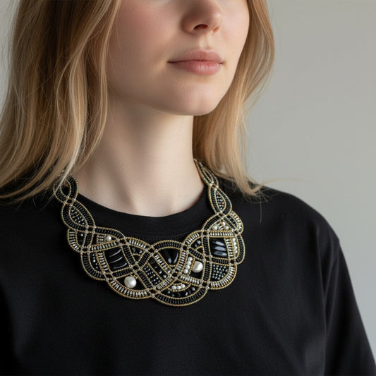 Trebor Style Ziio New Romance bib necklace featuring black onyx, white pearls, and silver beads on a model.