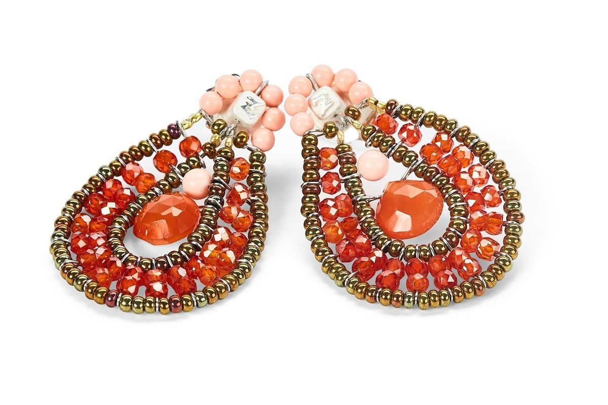 Trebor Style Ziio Tabiz collection drop earrings featuring orange zircon, carnelian, and Murano glass beads on wire.