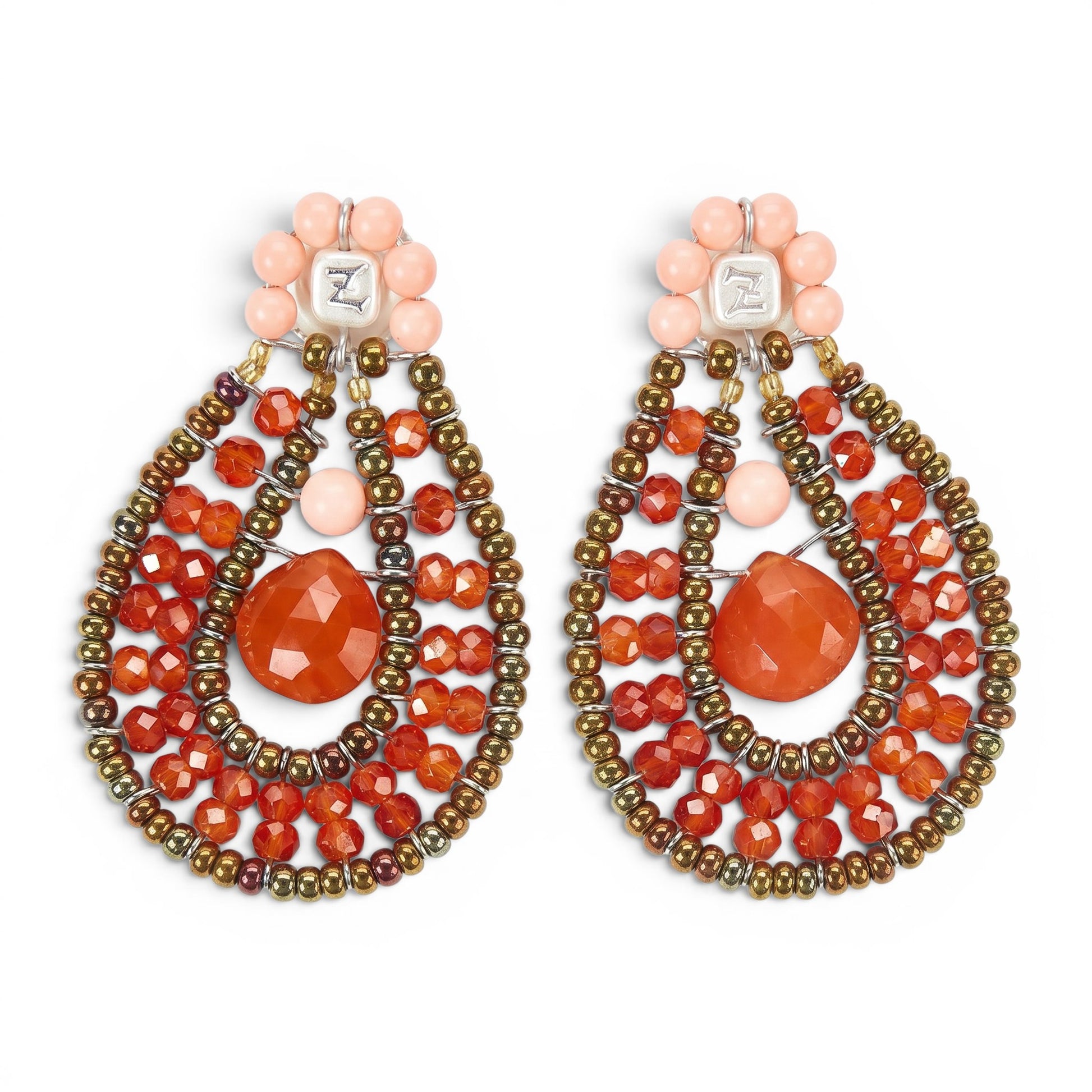 Trebor Style Ziio drop earrings featuring orange zircon, carnelian, and Murano glass beads on stainless steel wire.