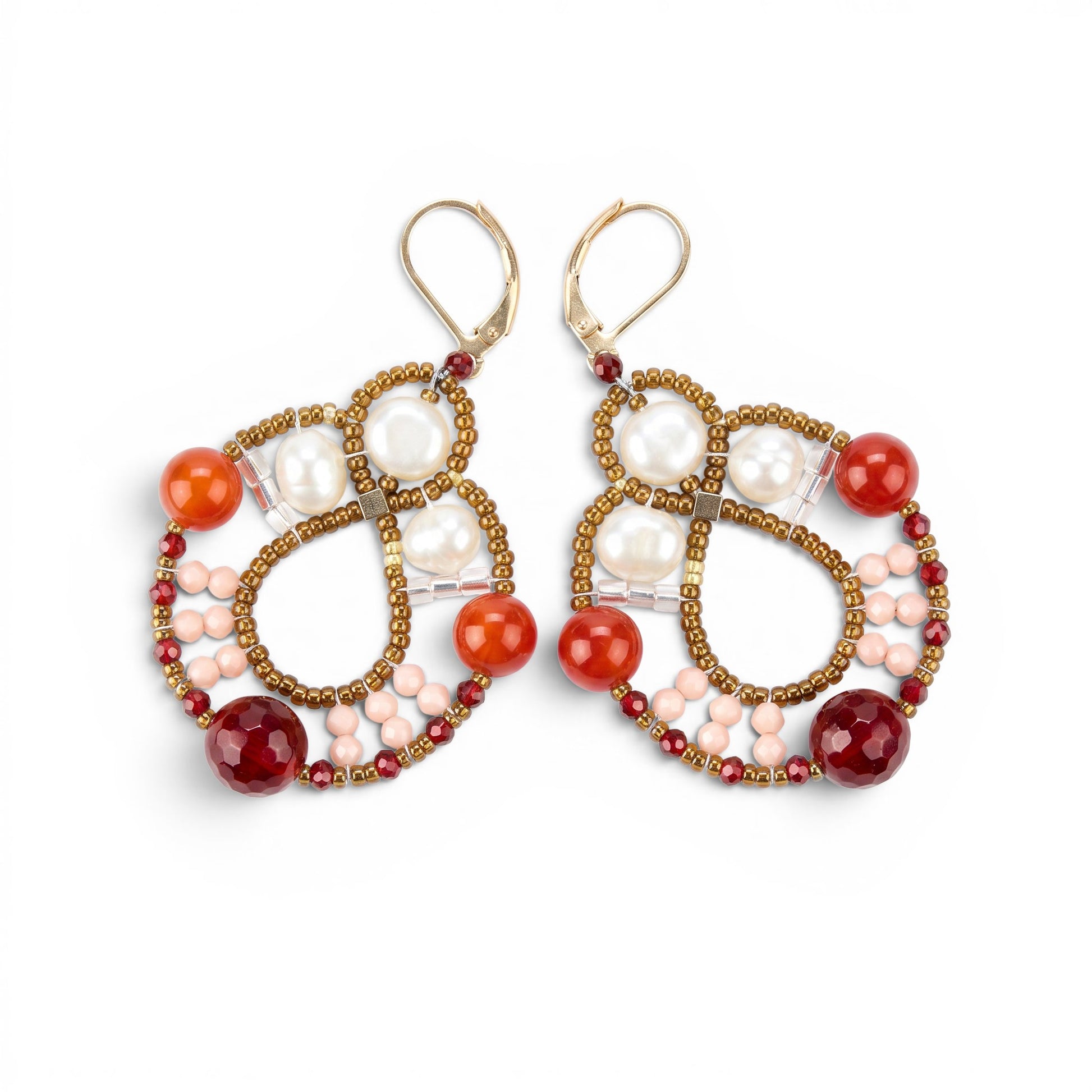 Trebor Style Ziio Galaxie drop earrings featuring white pearls, red agate, and Murano glass beads on gold posts.