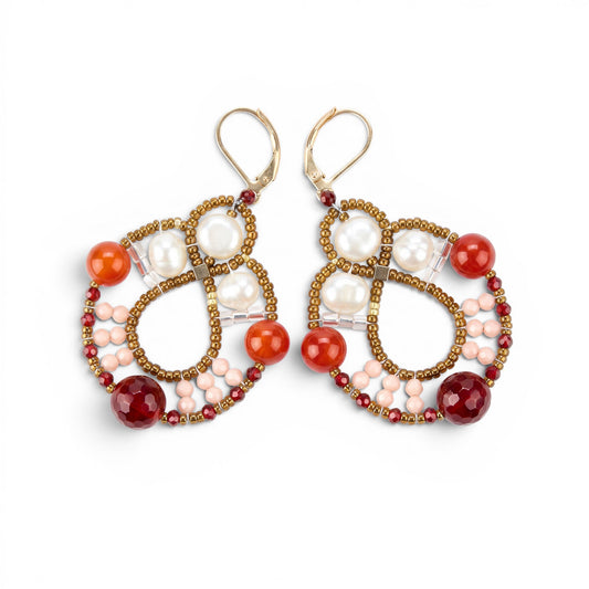 Trebor Style Ziio Galaxie drop earrings featuring white pearls, red agate, and Murano glass beads on gold posts.