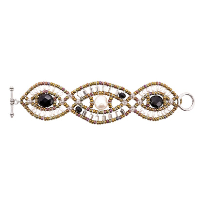 Trebor Style Ziio cuff bracelet featuring white pearls, black onyx, and Murano glass beads on stainless steel wire.