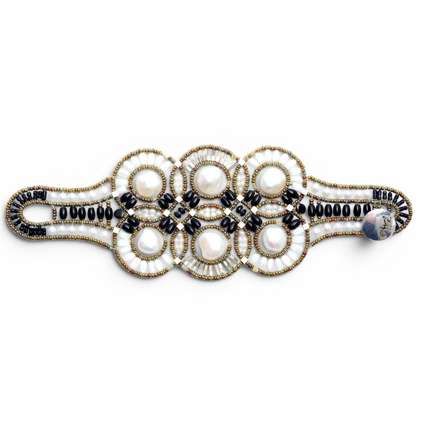 Trebor Style Ziio cuff bracelet featuring large white baroque pearls, black onyx, tourmaline, and Murano glass beads.