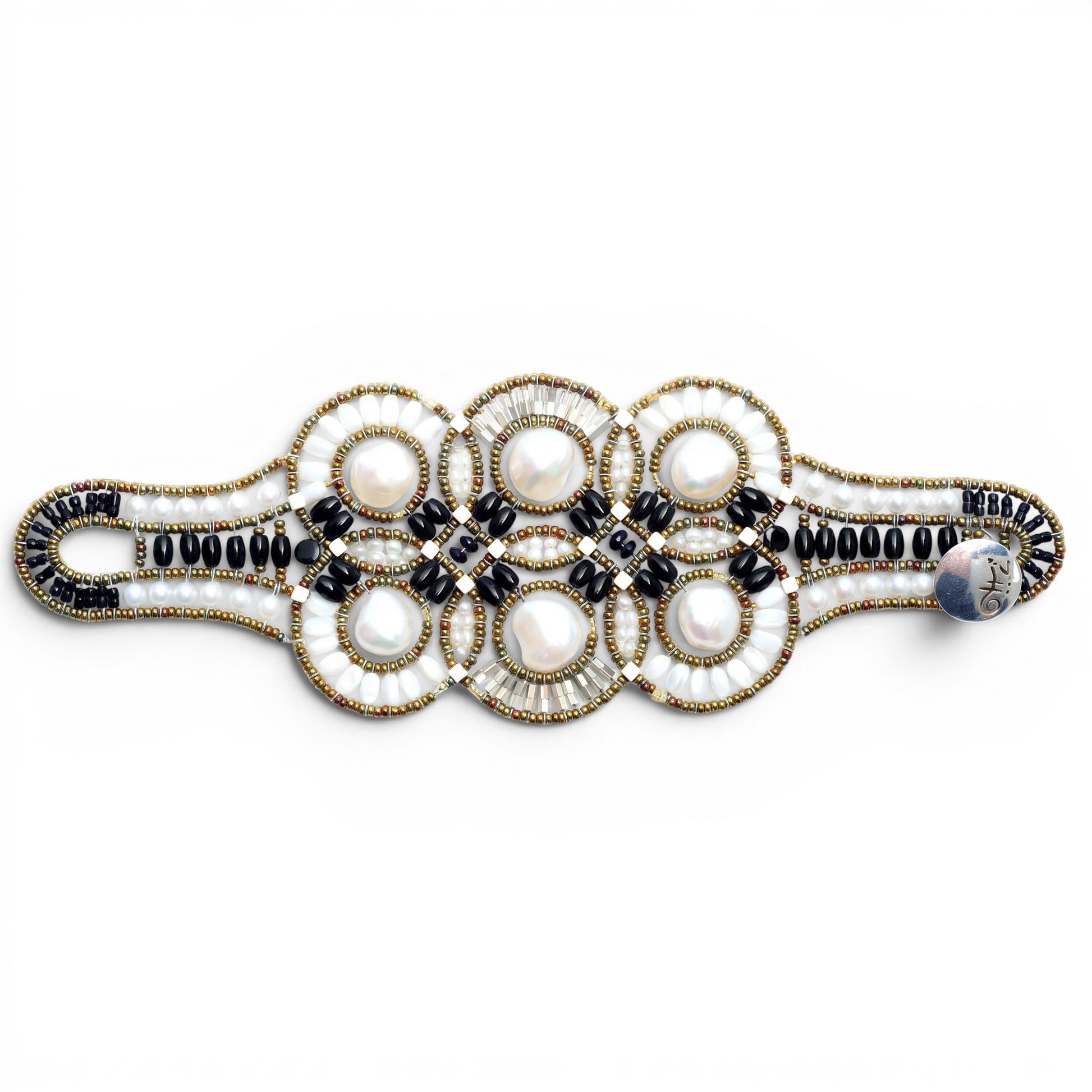 Trebor Style Ziio cuff bracelet featuring large white baroque pearls, black onyx, tourmaline, and Murano glass beads.