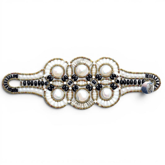 Trebor Style Ziio cuff bracelet featuring large white baroque pearls, black onyx, tourmaline, and Murano glass beads.
