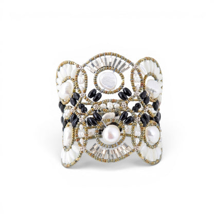 Trebor Style Ziio cuff bracelet featuring large white baroque pearls, black onyx, tourmaline, and Murano glass beads.