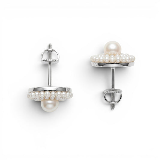 Trebor Style Ziio white freshwater pearl stud earrings with Murano glass beads and sterling silver posts.