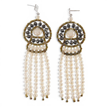 Trebor Style Ziio long chandelier earrings featuring white freshwater pearls, pyrite, and Murano glass seed beads.