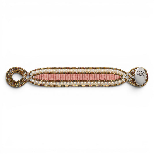 Trebor Style Ziio Dami cuff bracelet featuring pink howlite beads, white seed pearls, and a sterling silver button clasp.