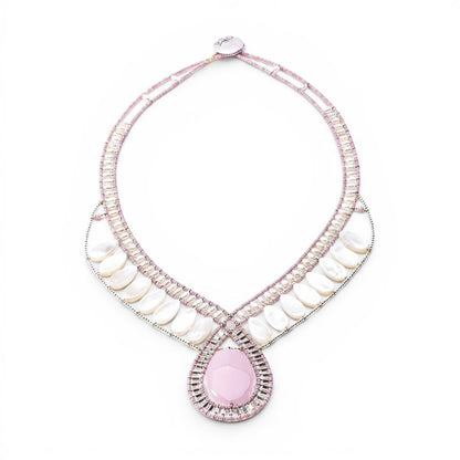Trebor Style Ziio statement necklace featuring a pink rhodochrosite cabochon, mother of pearl, and Murano glass beads.