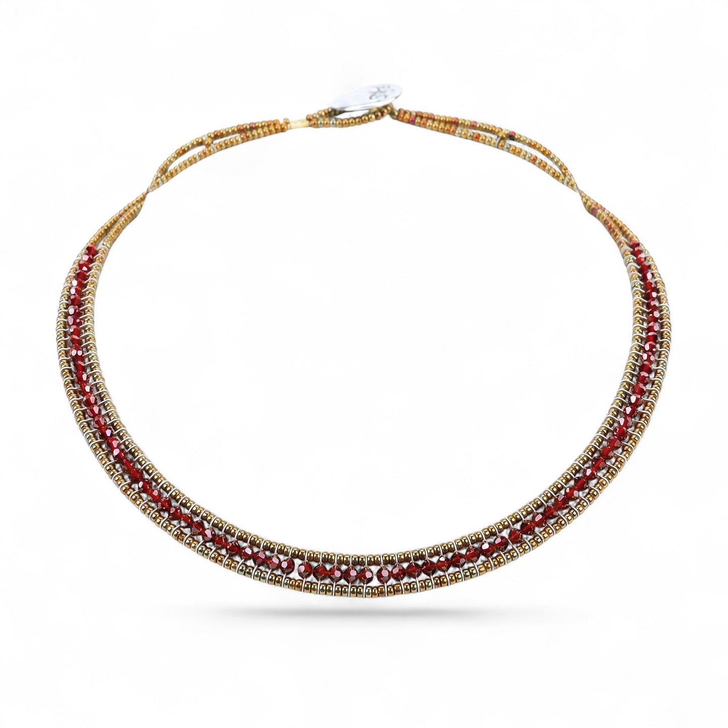 Trebor Style Ziio narrow Giro necklace featuring sparkling red zircon gemstones, Murano glass beads, and silver button.