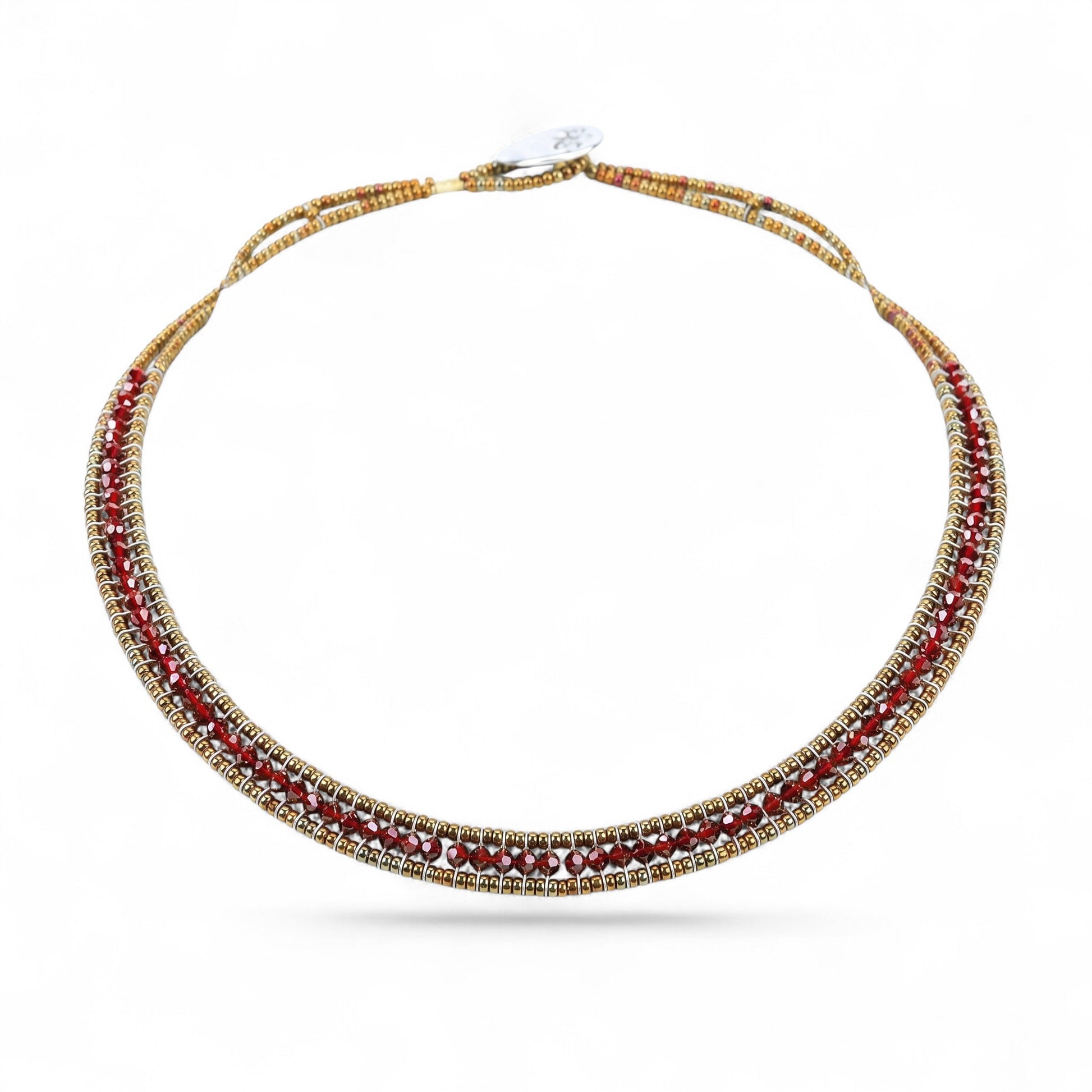 Trebor Style Ziio narrow Giro necklace featuring sparkling red zircon gemstones, Murano glass beads, and silver button.
