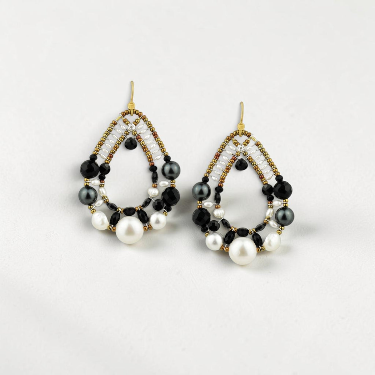 Trebor Style Ziio Shinju chandelier earrings with black onyx, spinel, tourmaline, and pearls on golden Murano beads.